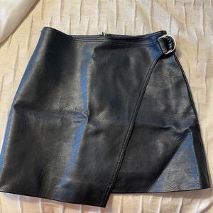 Black leather mini skirt
